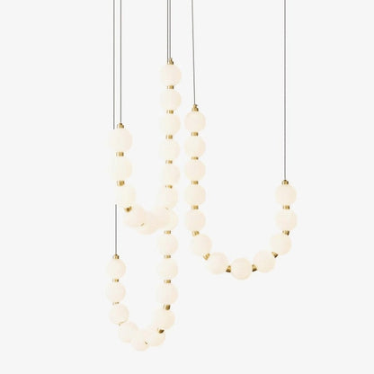 acrylic-pearl-necklace-chandelier-27_ca48aeeb-682d-46d4-897c-a55c6f46c490.jpg